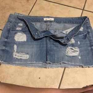 Mini skirt and brand is 21 Denim